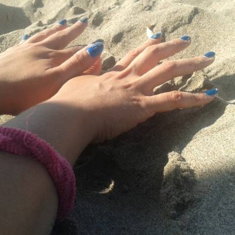 le mie mani nella sabbia